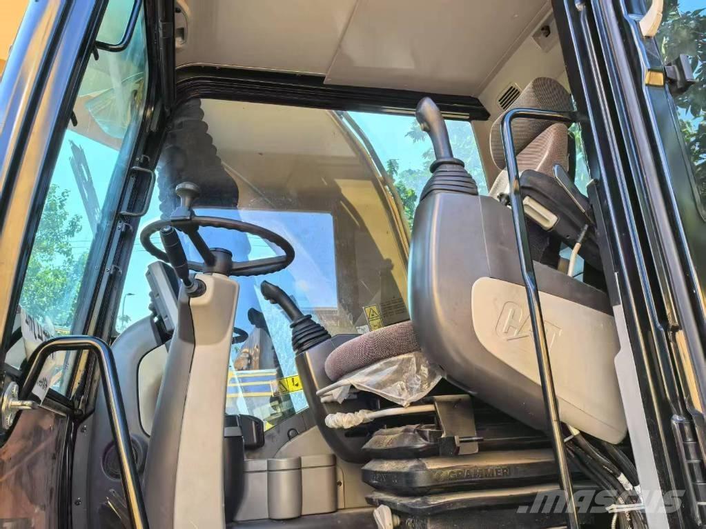 CAT M 315 D Ekskavatori uz riteņiem