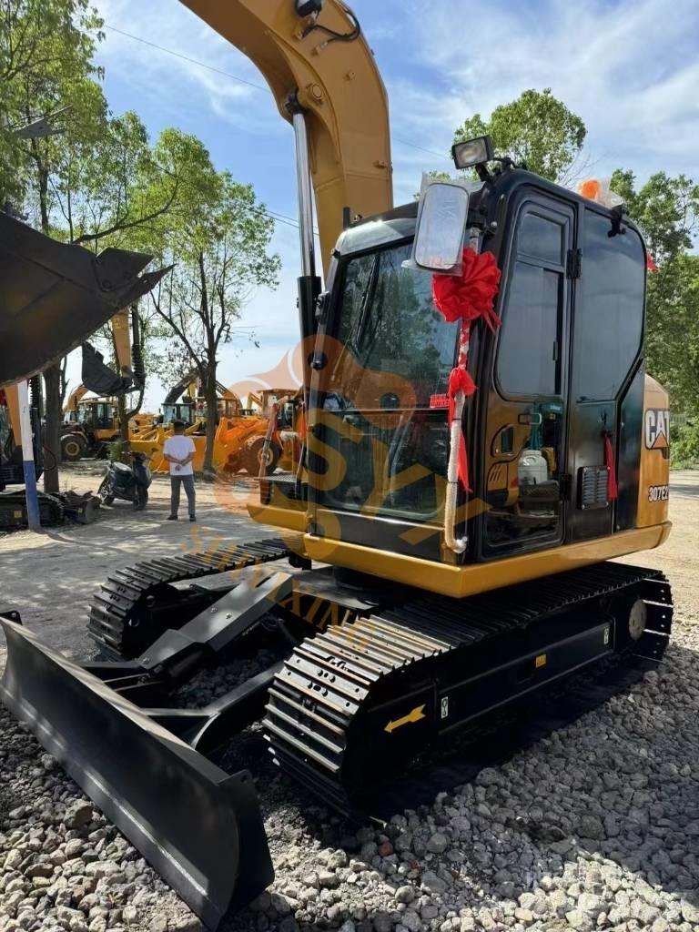 CAT 307 E2 Vidēja lieluma ekskavatori 7 t - 12 t