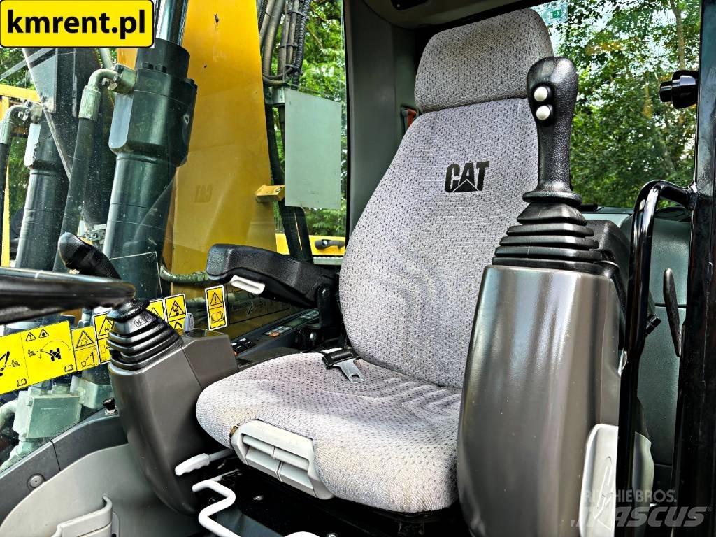CAT M 313 D Ekskavatori uz riteņiem