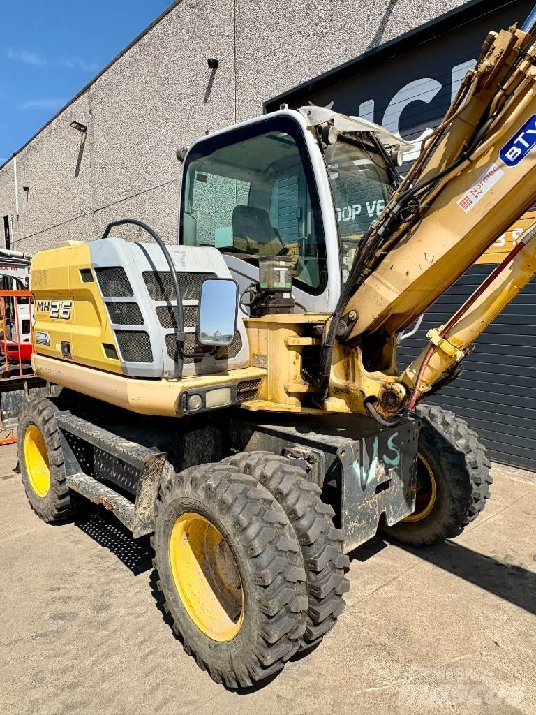 New Holland MH 2.6 Ekskavatori uz riteņiem