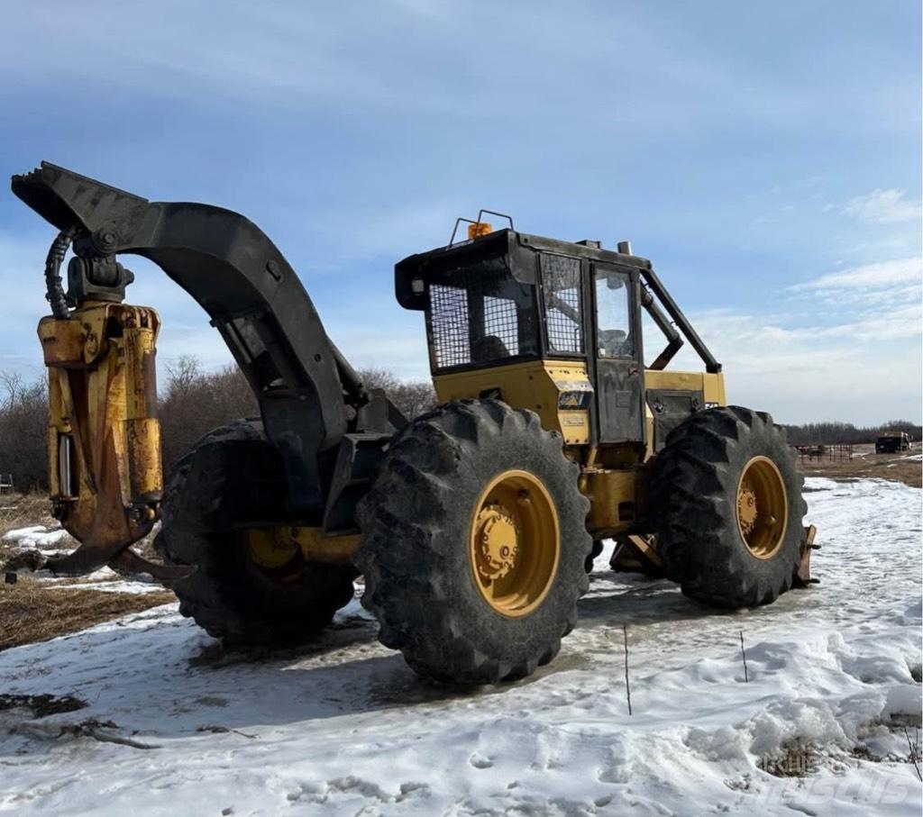 CAT 518 Šķeldotāji