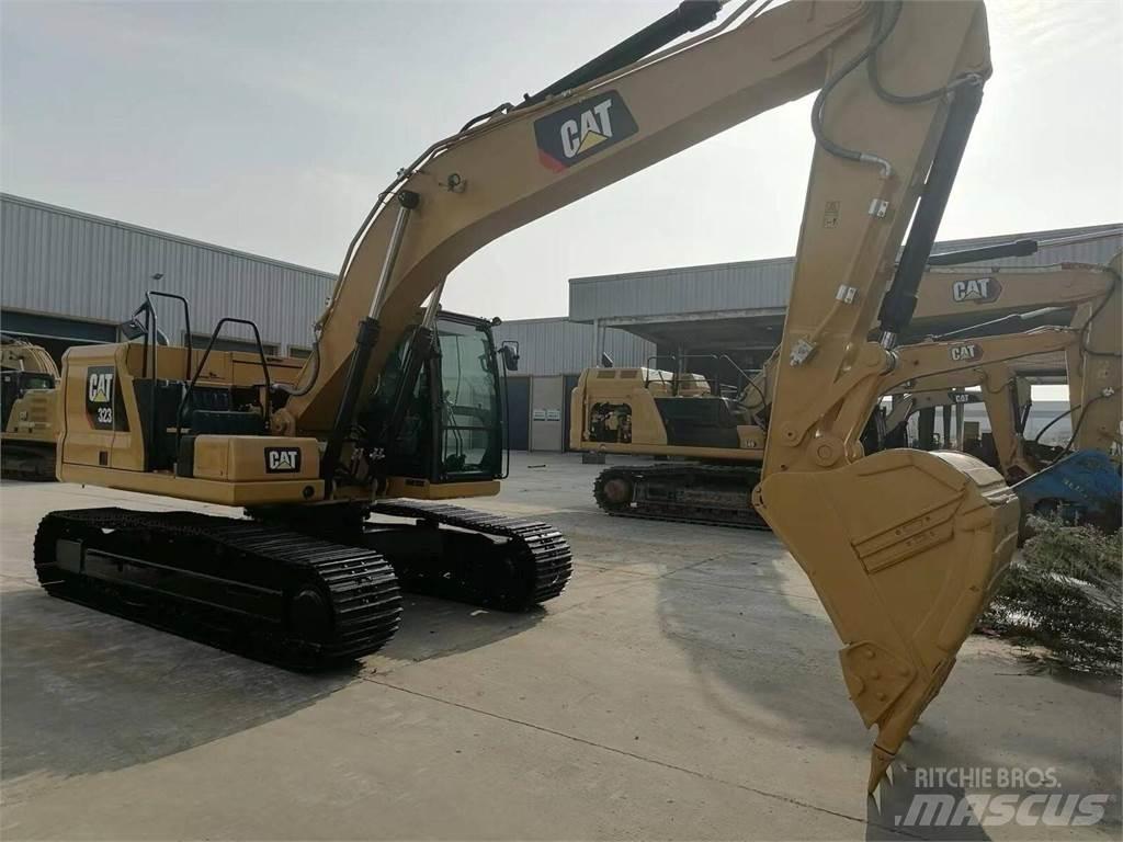 CAT 323 Kāpurķēžu ekskavatori
