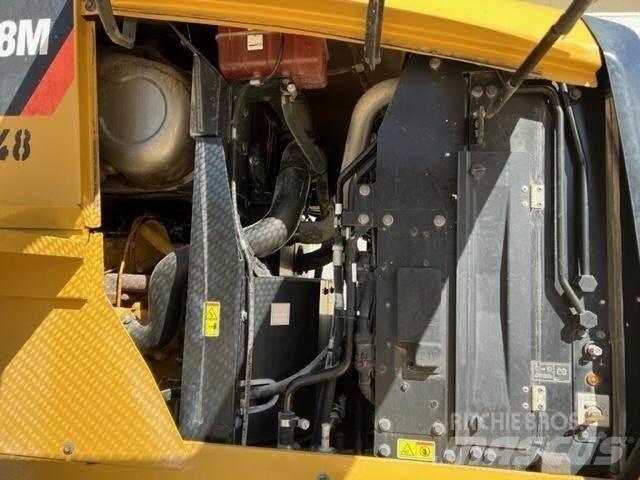 CAT 938M Iekrāvēji uz riteņiem