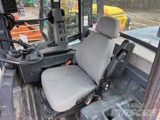 John Deere 544K Iekrāvēji uz riteņiem