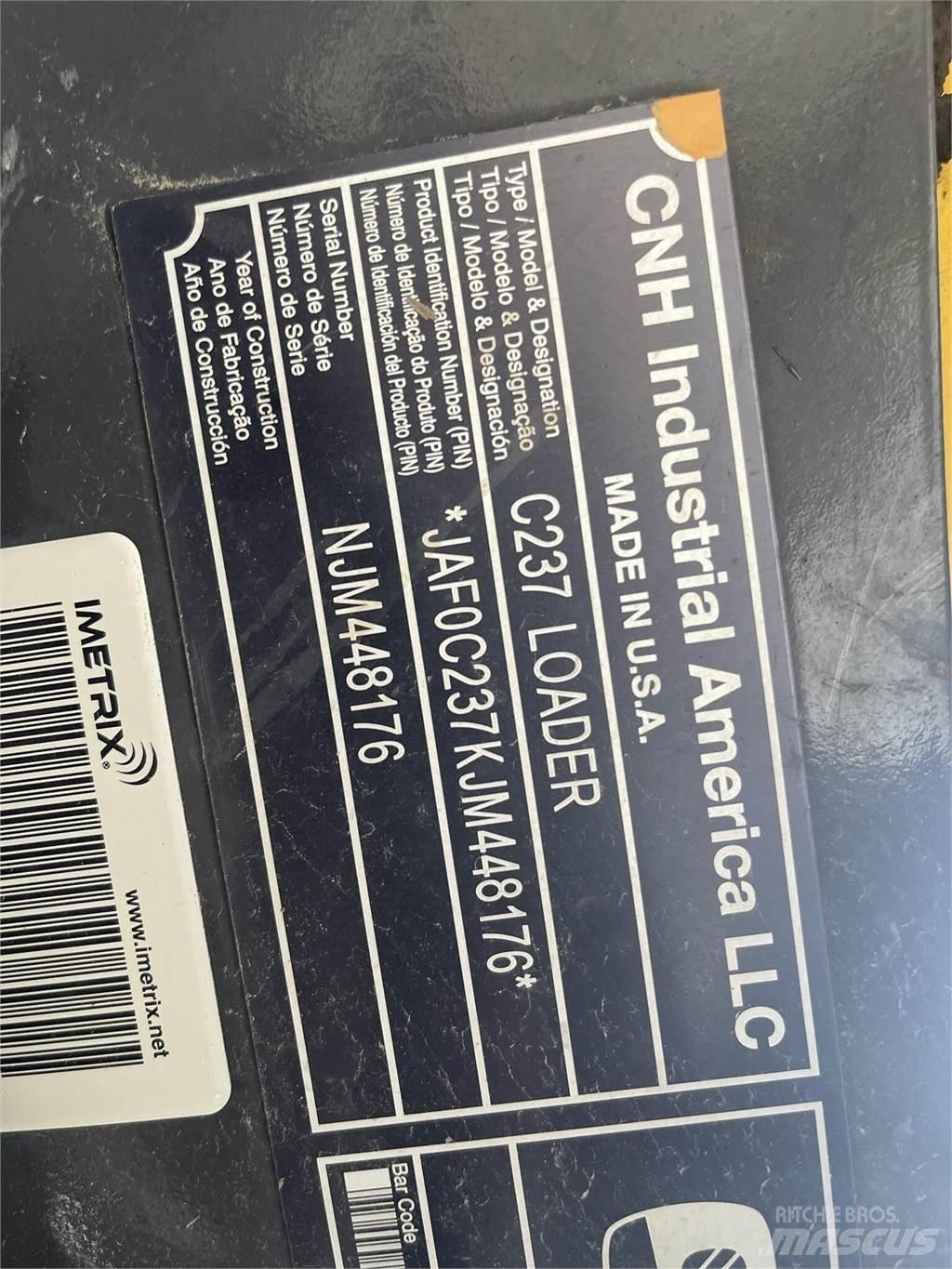 New Holland C237 Lietoti riteņu kompaktiekrāvēji
