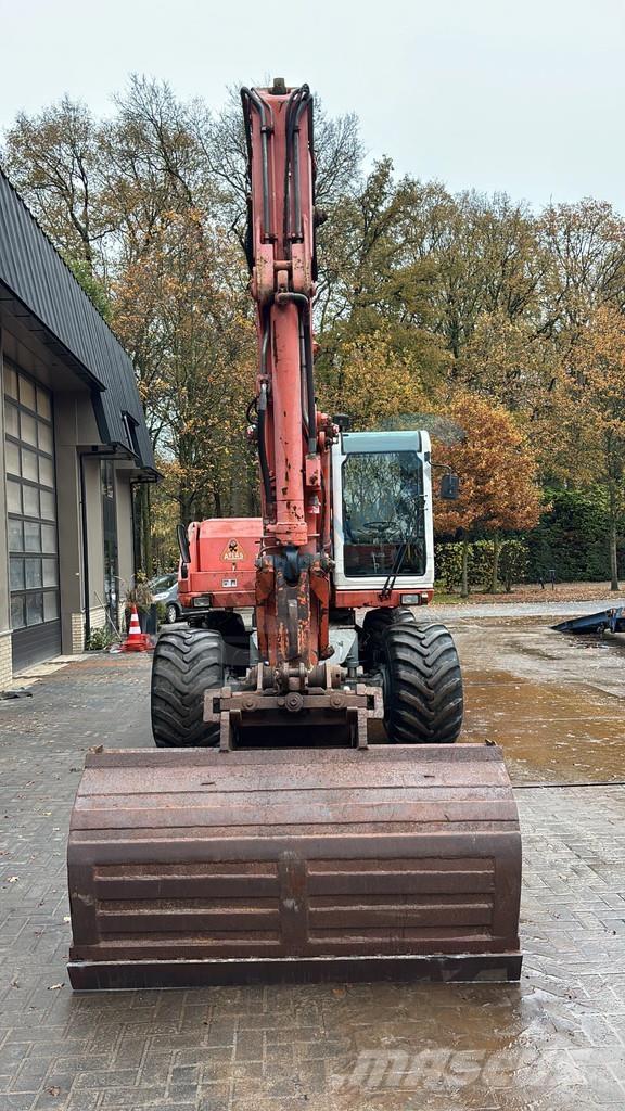 Atlas 1304 Ekskavatori uz riteņiem