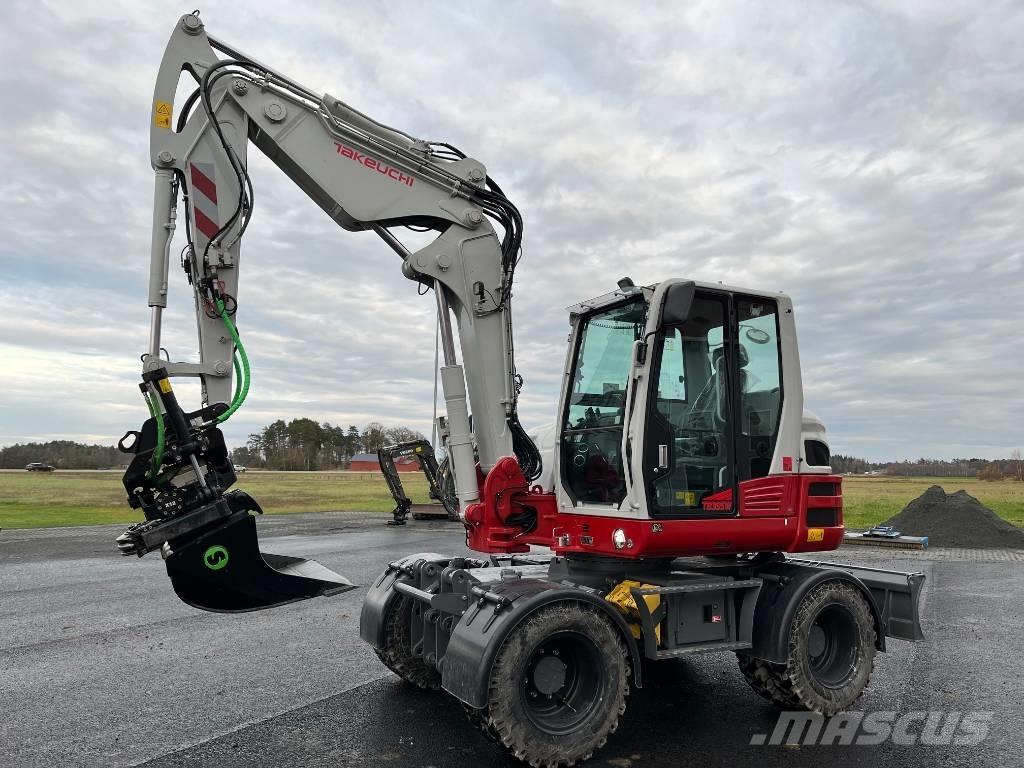 Takeuchi TB 395 W Ekskavatori uz riteņiem