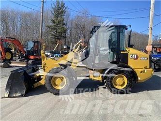 CAT 906M Iekrāvēji uz riteņiem