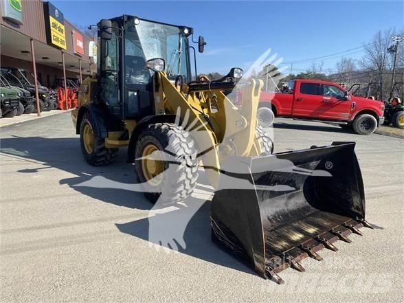 CAT 906M Iekrāvēji uz riteņiem
