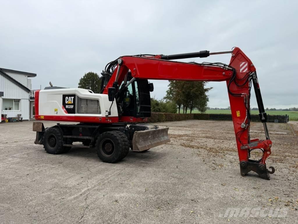 CAT M320F Ekskavatori uz riteņiem