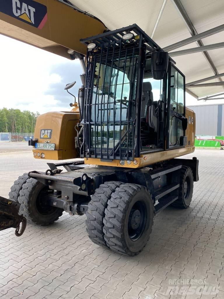 CAT M 320 F Ekskavatori uz riteņiem