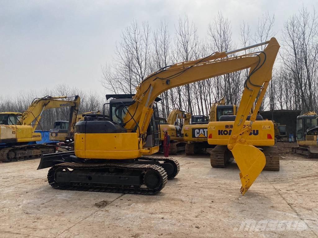 Komatsu PC128US Kāpurķēžu ekskavatori