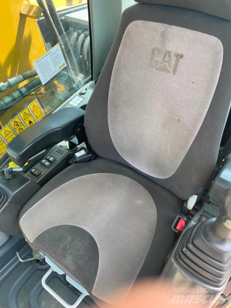 CAT M 313 D Ekskavatori uz riteņiem