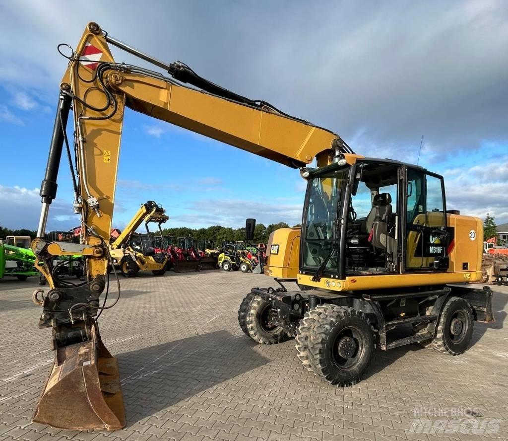 CAT M 318 F Ekskavatori uz riteņiem