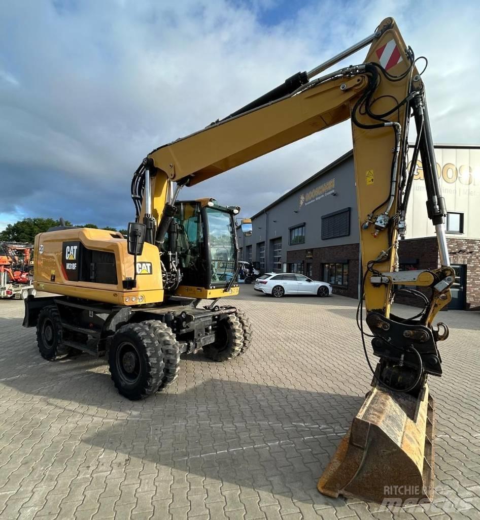 CAT M 318 F Ekskavatori uz riteņiem