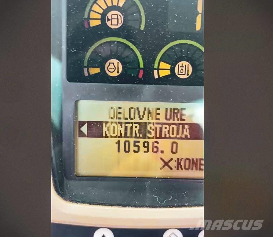 CAT M 313 C Ekskavatori uz riteņiem