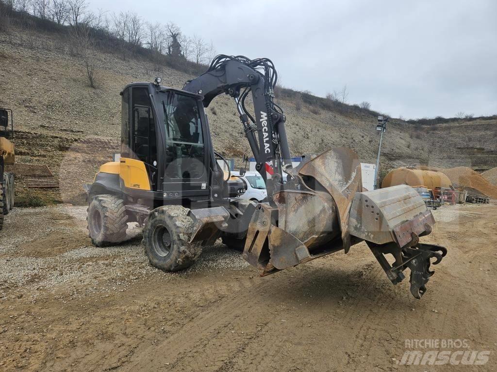 Mecalac 12 M TX Ekskavatori uz riteņiem