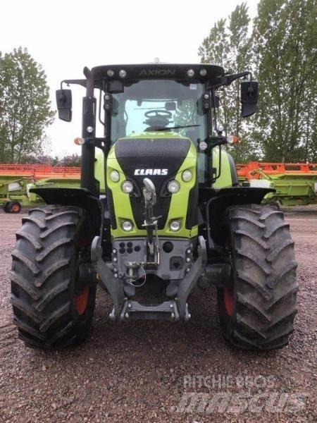 CLAAS AXION 810 Traktori