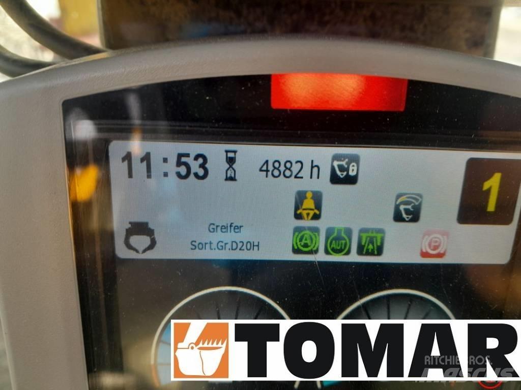 CAT M 314 F Ekskavatori uz riteņiem