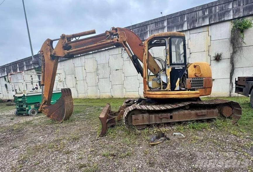 Komatsu PC 128 UU-1E Kāpurķēžu ekskavatori