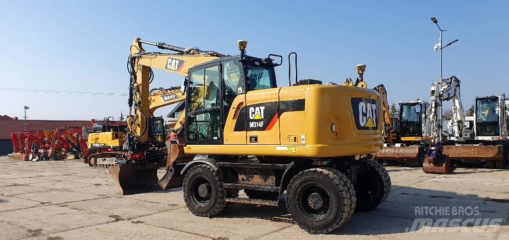 CAT M314 F Ekskavatori uz riteņiem