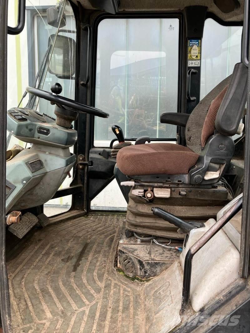 CAT 906 Iekrāvēji uz riteņiem