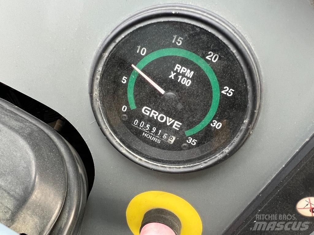 Grove RT540E Celtņi nelīdzenām virsmām