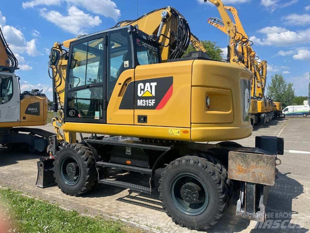 CAT M 315 F Ekskavatori uz riteņiem