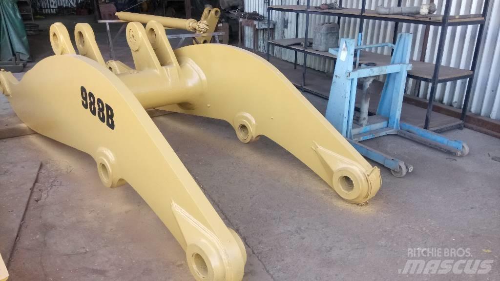 CAT 988 B Strēles un kausi