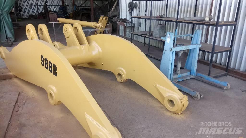 CAT 988 B Strēles un kausi