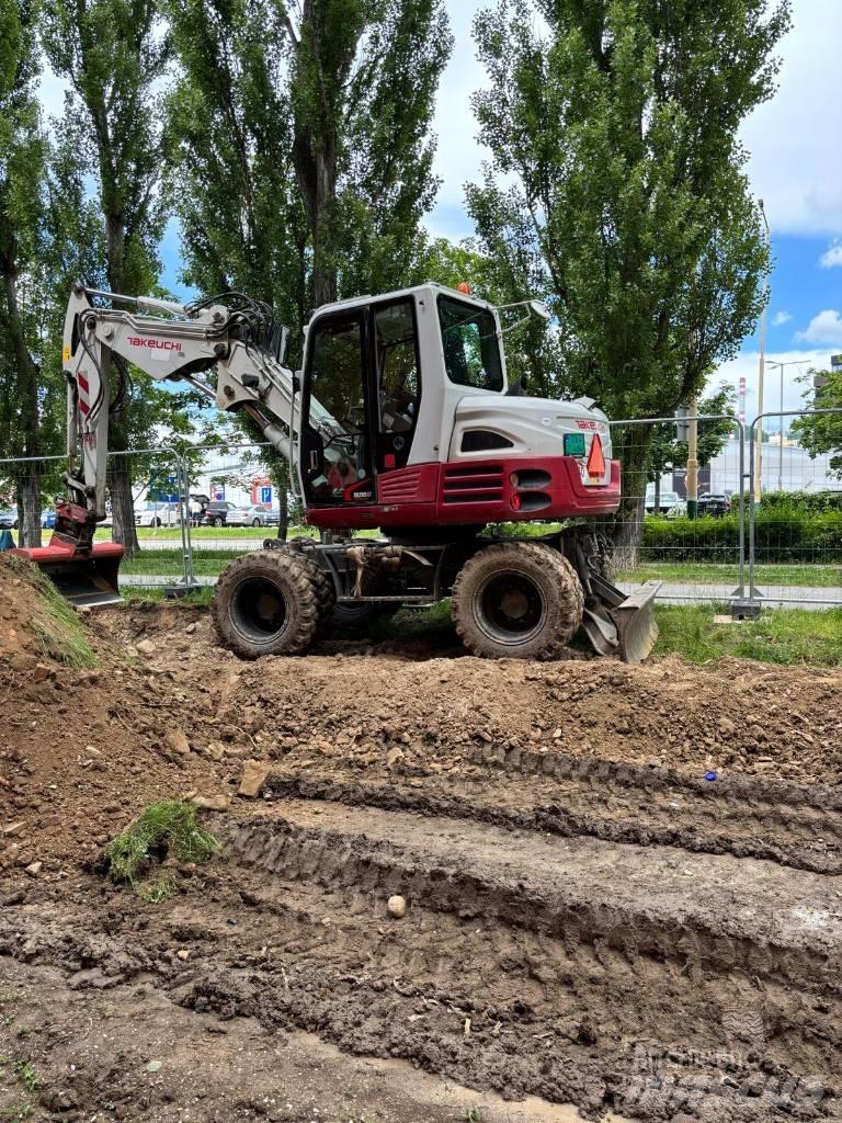 Takeuchi TB295W Ekskavatori uz riteņiem