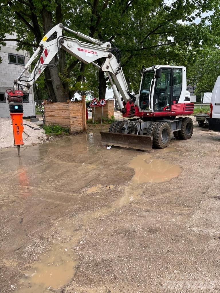 Takeuchi TB295W Ekskavatori uz riteņiem