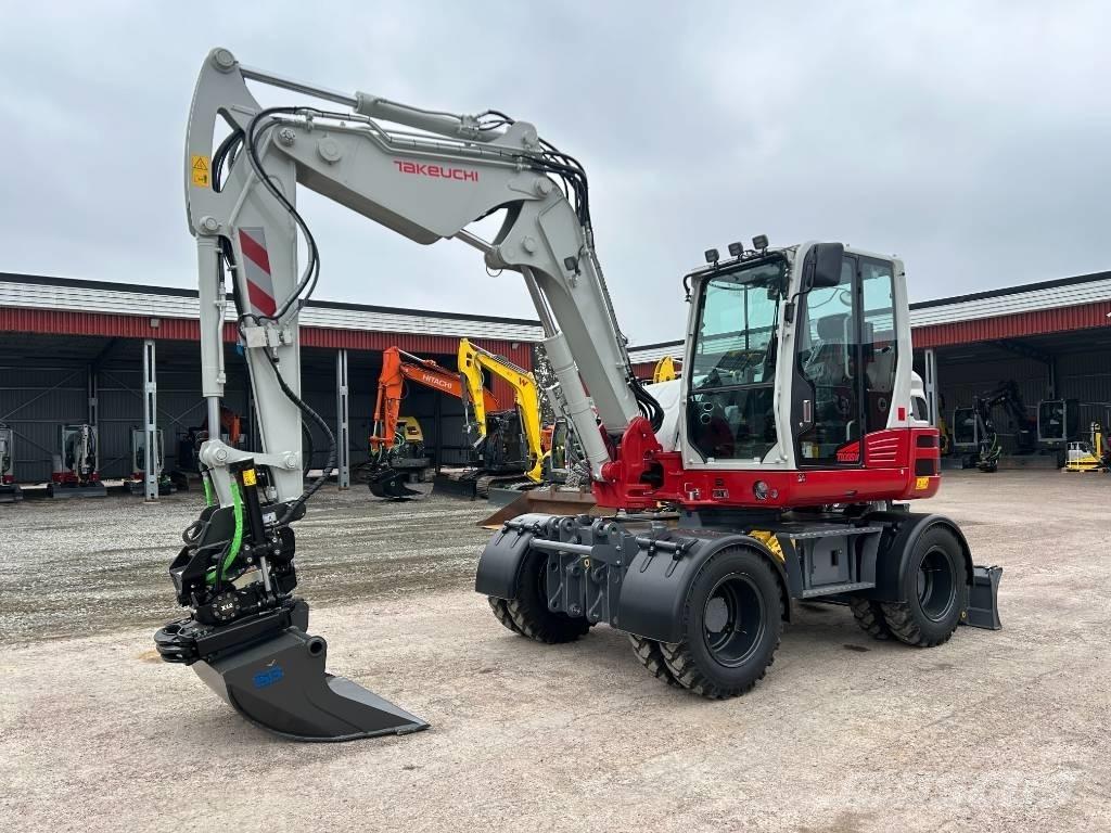 Takeuchi TB395W Ekskavatori uz riteņiem