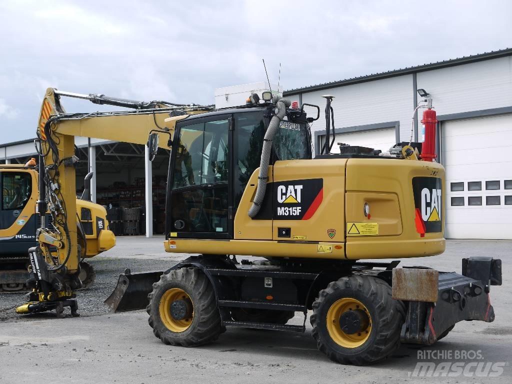 CAT M 315 F Ekskavatori uz riteņiem