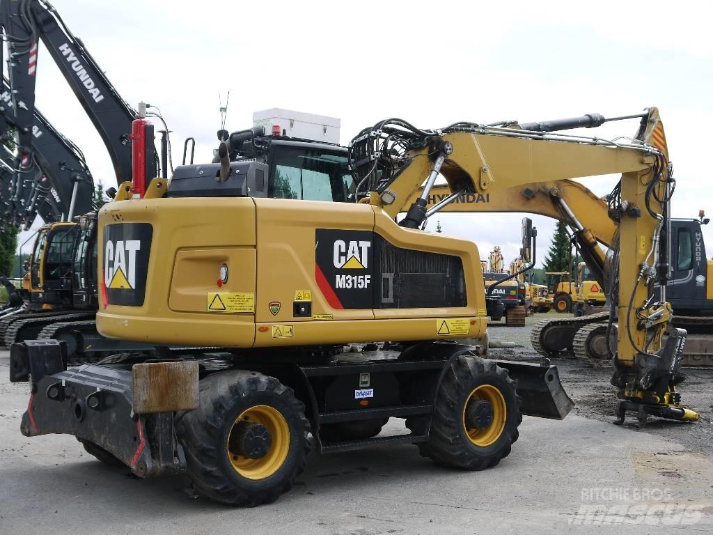 CAT M 315 F Ekskavatori uz riteņiem