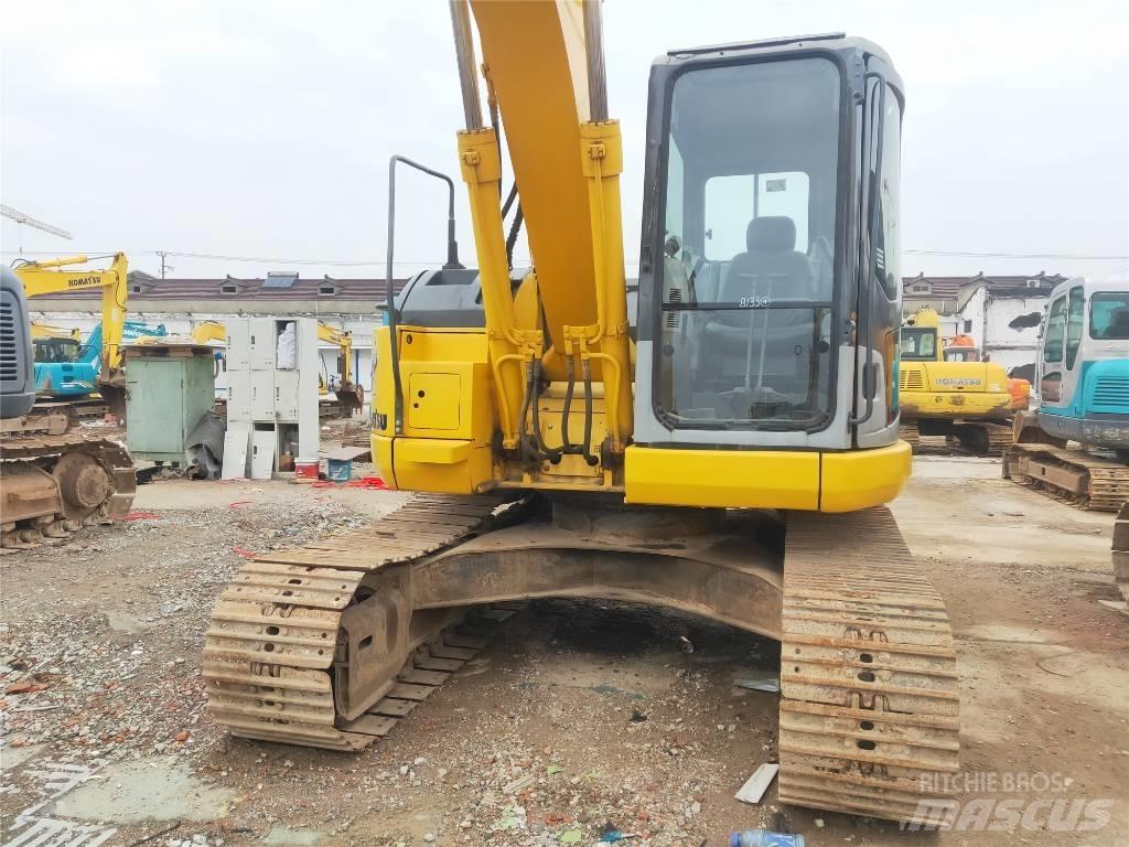 Komatsu PC 128 US Vidēja lieluma ekskavatori 7 t - 12 t