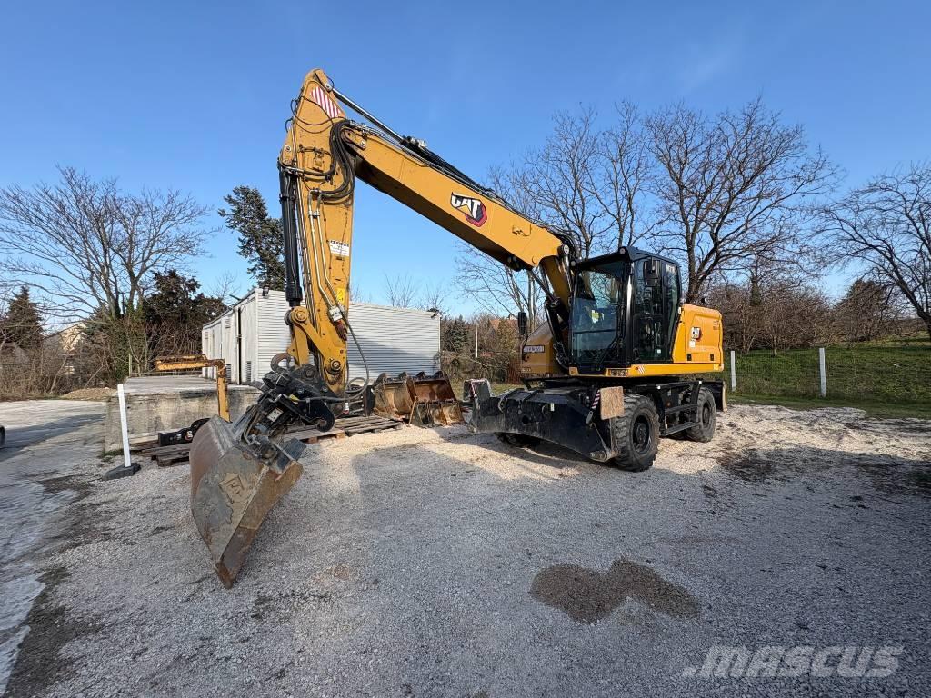 CAT M 318 Ekskavatori uz riteņiem