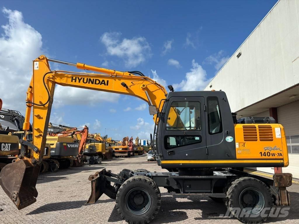Hyundai 140W-7A Ekskavatori uz riteņiem