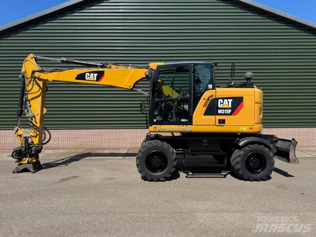 CAT M 315 F Ekskavatori uz riteņiem