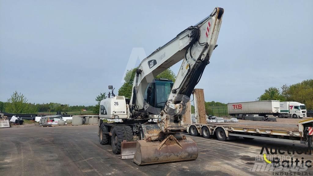 CAT M 322 D Ekskavatori uz riteņiem