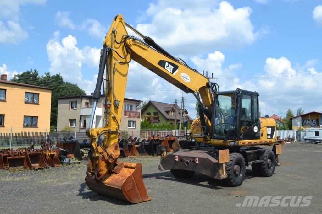 CAT M 315 D Ekskavatori uz riteņiem