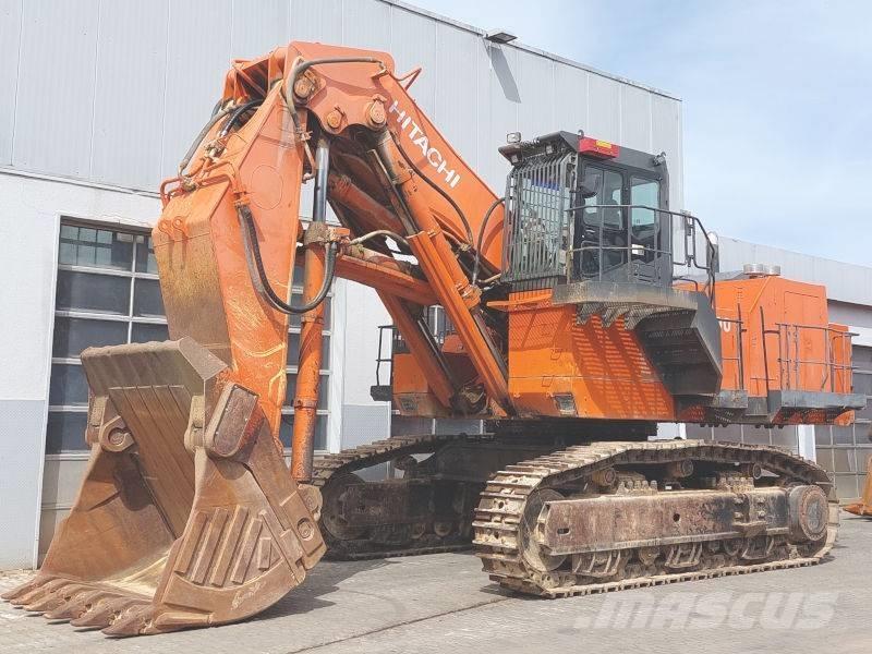 Hitachi EX 1200-6 Ekskavatori ar kausu priekšā