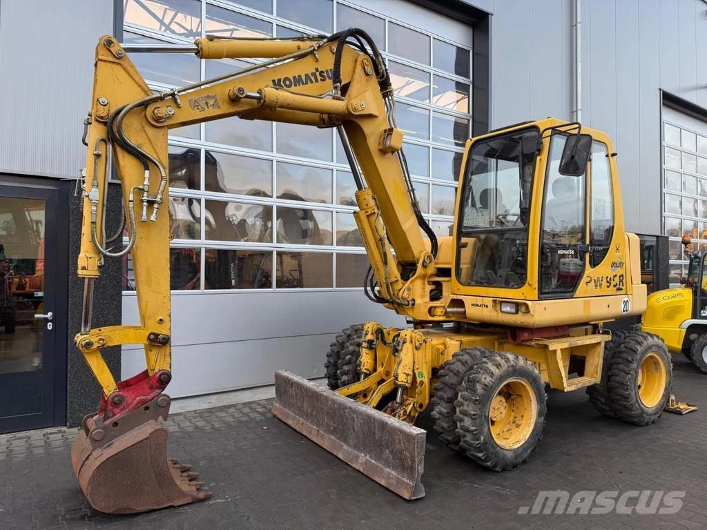 Komatsu PW95 Vidēja lieluma ekskavatori 7 t - 12 t