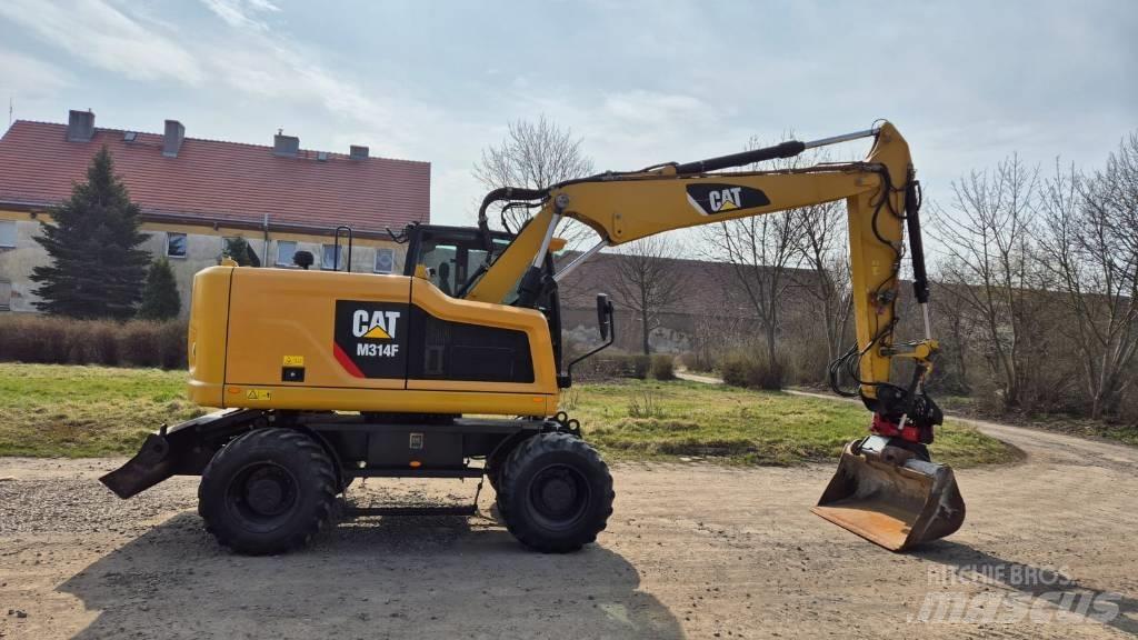 CAT M 314 F Ekskavatori uz riteņiem