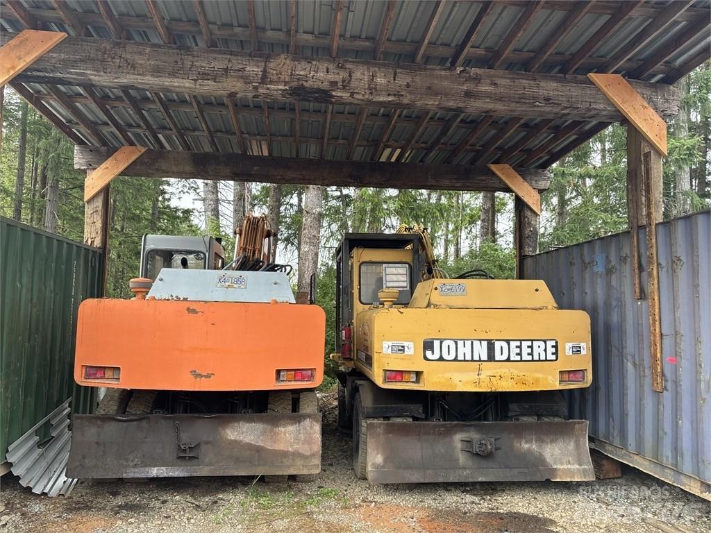 DEERE 595D Ekskavatori uz riteņiem