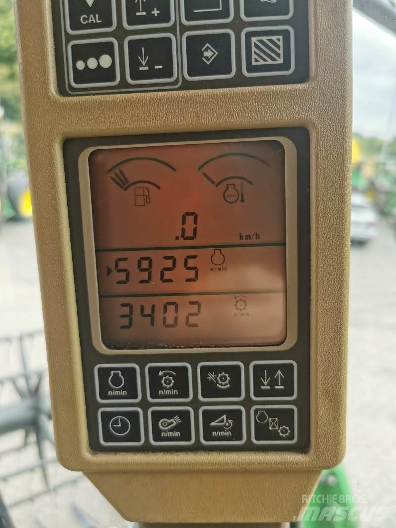John Deere T560 Ražas novākšanas kombaini