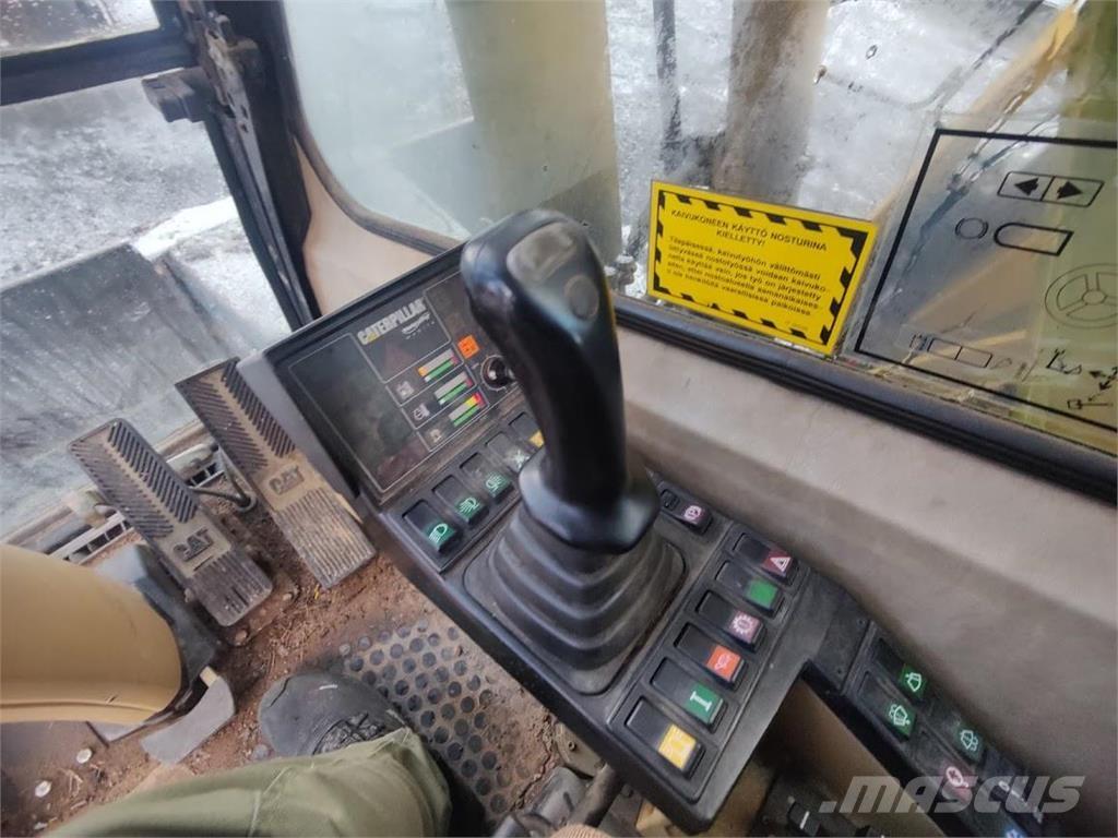 CAT M315 Ekskavatori uz riteņiem