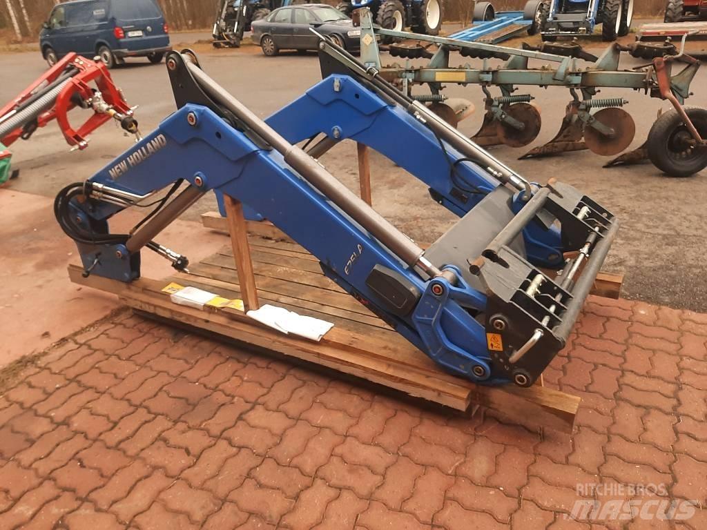 New Holland 675 LA Frontālie iekrāvēji un ekskavatori