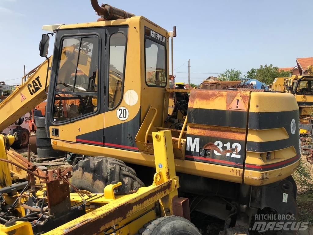 CAT M 312 FOR PARTS Ekskavatori uz riteņiem