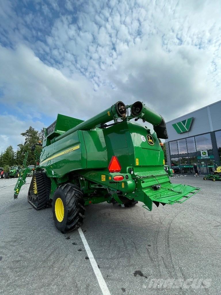 John Deere T670 i Ražas novākšanas kombaini